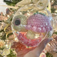 Strawberry baby turtle in big Christmas ball